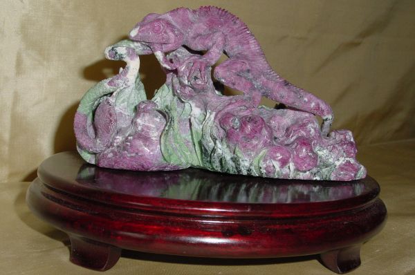 SOLD: Remarkably Realistic Lizard Gobbles a Snake