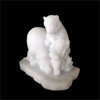 Two Docile Polar Bears led by an Eskimo